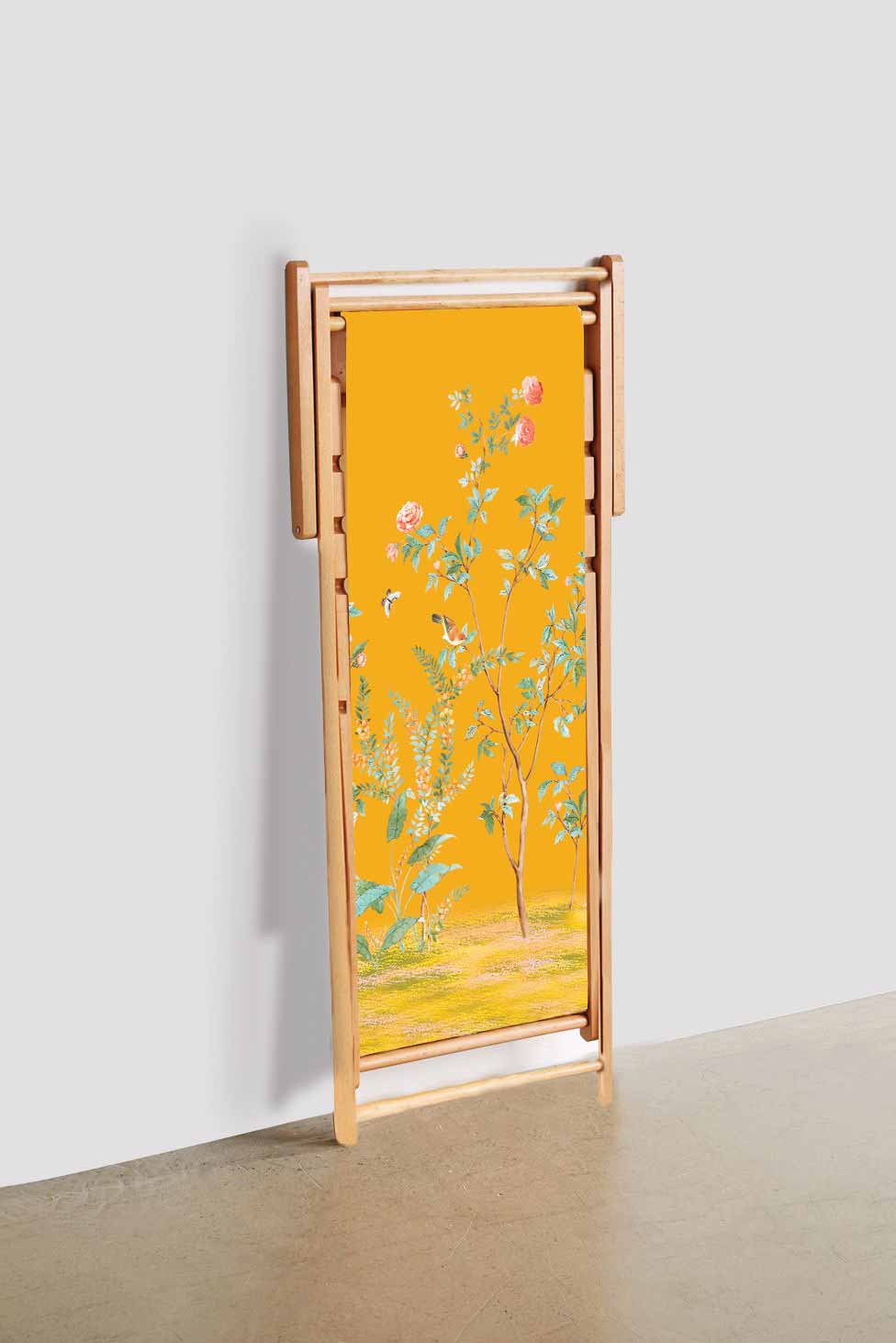 Deckchair with yellow fabric with floral pattern