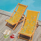 Deckchair with yellow fabric with floral pattern